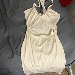 Crème mini dress with cut out